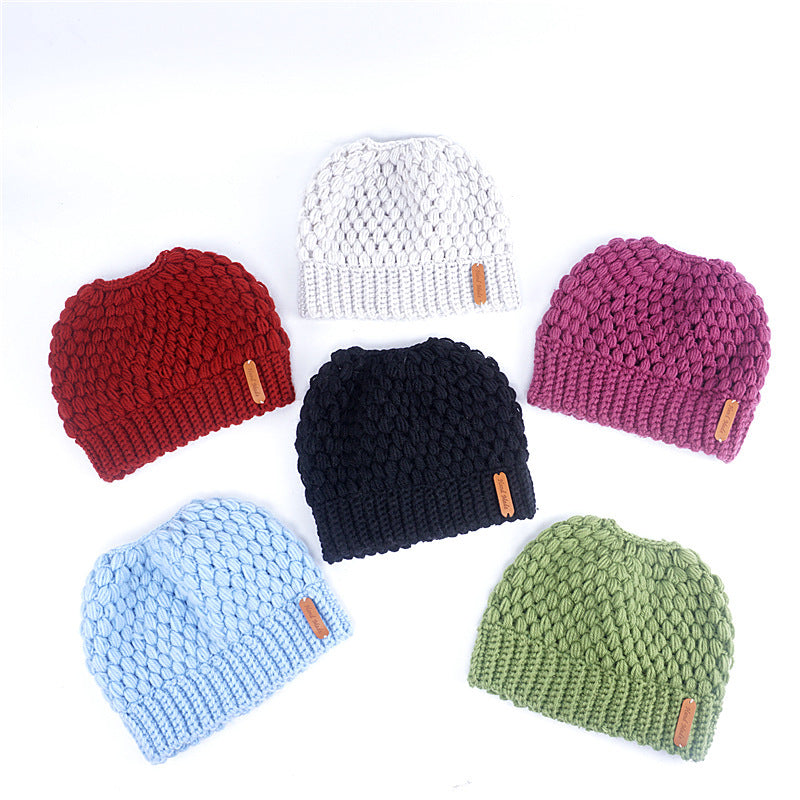 winter earmuffs wool hat fashion labeling empty top hat Europe and the United States new knit hat winter ladies horsetail hat  J&E Discount Store 